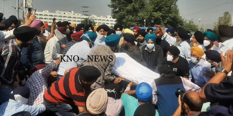 Family members, relatives of slain School principal stage silent sit-in outside Civil Secretariat, Sgr