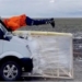 Russian stuntman Evgeny Chebotarev pulled a new dangerous stunt by flying through a Mercedes minibus traveling at 50 mph