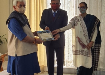IT, Central GST departments present book on taxpayers outreach programs in JK to LG