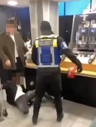 Female customer punched by security guard in popular food outlet