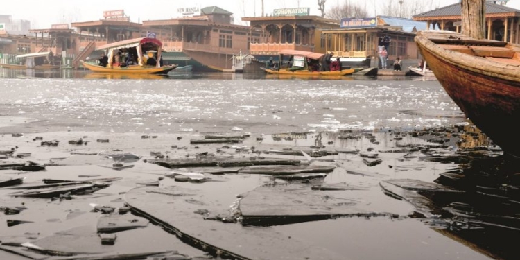 Frozen Dal Lake: Shikara operators face tough battle against severe cold