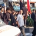 Thousands Join 8th Muharram Mourning Amid Tight Security, Police, Volunteers Distribute Water to Mourners Battling Summer Heat